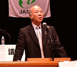 あいさつする宮澤組合長