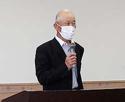 あいさつする工藤会長