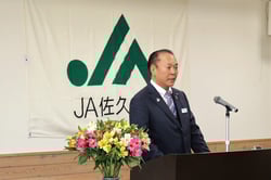 あいさつする髙栁組合長