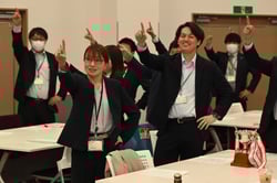 一致団結する渉外担当者ら