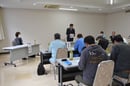 きのこ部会通常総会であいさつをする榑沢春幸部会長
