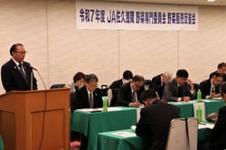 あいさつする髙栁組合長